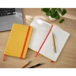 Leitz COSY Soft touch jegyzetfüzet (A5), meleg sárga, vonalas